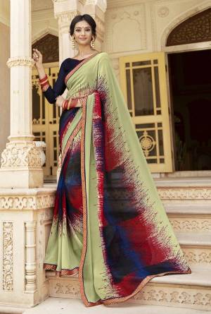 For Your Semi-Casual Wear, Grab This Pretty Attractive Saree In Pastel Green and Multi Color Paired With Contrasting Violet Colored Blouse. This Saree Is Fabricated On Georgette Which Is Light Weight And Easy To Carry All Day Long.