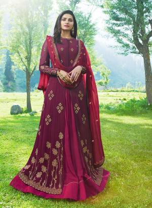 Add This New Shade To Your Wardrobe With This Designer Semi-Stitched Suit In Wine Color Paired With Wine Colored Bottom And Dupatta. Its Top Is Fabricated On Georgette And Silk Paired With Santoon Bottom And Chiffon Dupatta. Buy This Now.