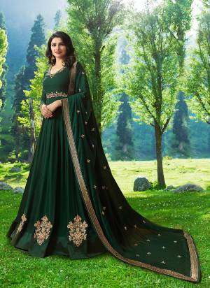 Earn Lots Of Compliments Wearing This Heavy Designer Floor Length Suit In Pine Green Color Paired With Pine Green Colored Bottom And Dupatta. Its Top Is Fabricated On Georgette Paired With Santoon Bottom And Chiffon Dupatta. Buy This Now.