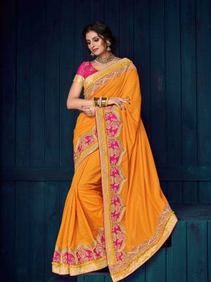 Presenting this orange color two tone silk saree. Ideal for party, festive & social gatherings. this gorgeous saree featuring a beautiful mix of designs. Its attractive color and designer heavy embroidered design, Flower patch butta resham, design, stone design, beautiful floral design work over the attire & contrast hemline adds to the look. Comes along with a contrast unstitched blouse.