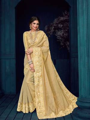 Flaunt a new ethnic look wearing this beige color linnen silk and jari saree. Ideal for party, festive & social gatherings. this gorgeous saree featuring a beautiful mix of designs. Its attractive color and designer heavy embroidered design, Flower patch design, moti design, beautiful floral design work over the attire & contrast hemline adds to the look. Comes along with a contrast unstitched blouse.