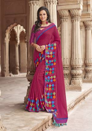 Shine Bright With This Attractive Looking Dark Pink Colored Saree Paired With Dark Pink Colored Blouse. This Saree Is Fabricated On Linen Paied With Satin Fabricated Blouse. This Saree And Blouse Are Beautified With Prints All Over. Buy Now.
