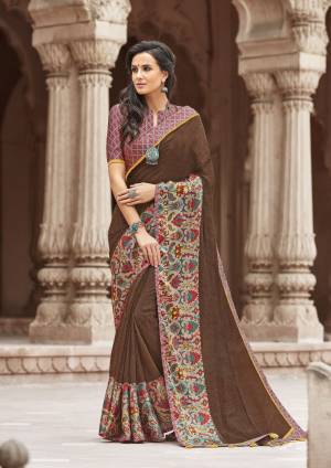 For A Rich And Elegant Look. Grab This Pretty Dark Green Color Paired With Contrasting Grey Colored Blouse. This Saree Is Fabricated On Linen Paired With Satin Fabricated Blouse. Buy This Pretty Saree Now.