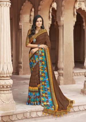 For A Rich And Elegant Look. Grab This Pretty Dark Green Color Paired With Contrasting Beige Colored Blouse. This Saree Is Fabricated On Linen Paired With Satin Fabricated Blouse. Buy This Pretty Saree Now.
