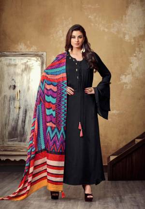 For A Bold and Beautiful Look, Grab This Designer Readymade Long Kurti In Black Color Paired With Multi Colored Scarf. This Kurti Is Fabricated On Rayon Paired With Muslin Cotton Sacrf. Buy This Soon Before The Stock Ends. 