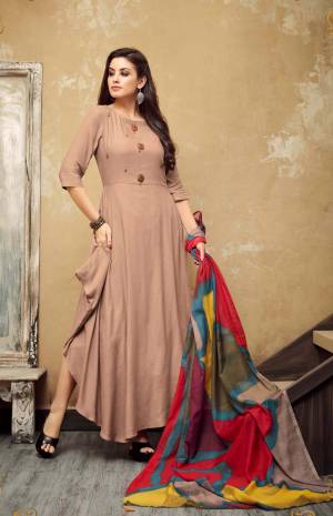 Look The Most Prettiest Of All Wearing This Designer Readymade Long Kurti In Dusty Pink Color Paired With Multi Colored Scarf. This Kurti Is Rayon Based Paired With Muslin Cotton Scarf. Both the Fabrics Are Light Weight And also This Kurti Will Earn You Lots Of Compliments From Onlookers.