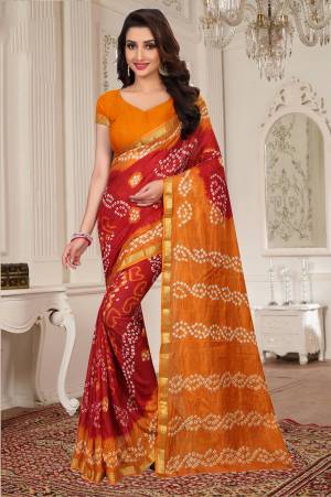 Red And Orange Color Induces Perfect Summery Appeal To Any Outfit, So Grab This Attractive Looking Saree In Red And Orange Color Paired With Orange Colored Blouse. Buy This Lovely Silk Based Saree Now.