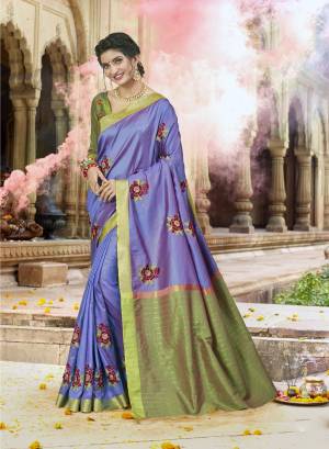 Here Is Beautiful Shade With This Violet Colored Saree Paired With Contrasting Green Colored Blouse. This Saree Is Fabricated On Satin Silk Paired With Art Silk Fabricated Blouse. It Has Contrasting Resham Embroidery With Stone Work.