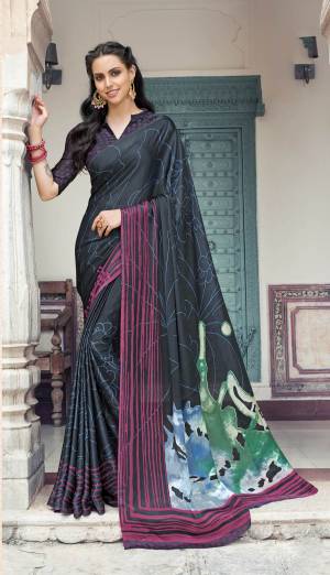 For A Bold and Beautiful Look, Grab This Designer Printed Saree In Black Color Paired With Black Colored Blouse. This Saree And Blouse Are Fabricated On Satin Georgette Beautified With Prints All Over It. Buy This Saree Now.