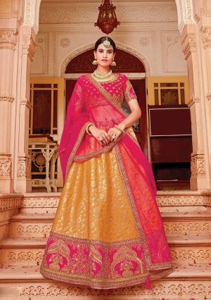 Adorned in vibrant Indian hues, this treasured lehenga is simple but with an added touch of sophistication.  Bring in the festivities with this vibrant lehenga and look priceless. 