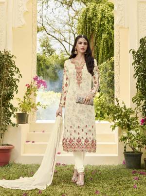 Simple And Elegant Looking Designer Straight Cut Suit Is Here In Cream Color Paired With Cream Colored Bottom And Dupatta. Its Top Is Georgette Based Paired With Santoon Bottom And Chiffon Dupatta. Buy This Suit Now.
