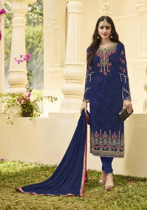 Shine Bright Wearing This Beautiful And Attractive Designer Straight Suit In Blue Color Paired With Blue  Colored Bottom And Dupatta. Its Top Is Fabricated On Georgette Paired With Santoon Bottom And Chiffon Dupatta With Printed Satin Inner.