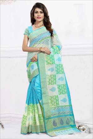 Grab This Beautiful Saree With Soft Color Pallete In Aqua Blue And White Color Paired With Aqua Blue And White Colored Blouse. This Saree And Blouse Are Cotton Based Beautified With Prints All Over It. 