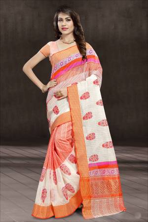 Celebrate This Festive Season Wearing This Pretty Attractive Orange And White Colored Saree Paired With Orange And White Colored Blouse. This Saree And Blouse Are Cotton Fabricated Beautified With Prints All Over. This Saree Is Light Weight And Durable. Buy Now.