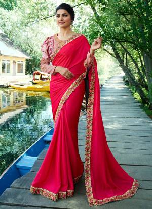 Shine Bright In This Lovely Shade Of Pink With This Designer Saree In Fuschia Pink Color Paired With Light Pink Colored Blouse. This Saree Is Soft Silk Based Paired With Art Silk And Satin Fabricated Blouse. Buy This Saree Now.