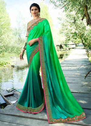 Go With The Shades Of Green With This Designer Saree In Shaded Green Color Paired With Cream Colored Blouse. This Saree Is Fabricated On Soft Silk Paired With Art Silk And Satin Fabricated Blouse. All Its Fabrics Ensures Superb Comfort All Day Long. 