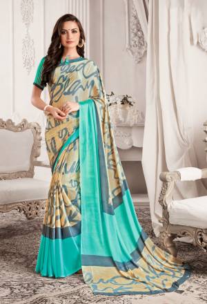 Add This Very Pretty And Light Weight Saree For Your Semi-Casuals In Cream Color Paired With Aqua Blue Colored Blouse. This Saree And Blouse Are Georgette Based Beautified With Prints. Buy Now.
