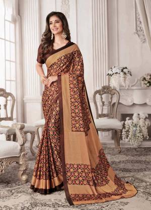 Flaunt Your Rich and Elegant Taste Wearing This Printed Saree In Brown Color Paired With Dark Brown Colored Blouse. This Saree And Blouse Are Georgette Based Floral And Geometric Prints.