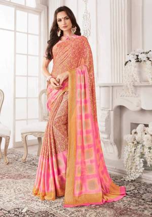 Look Pretty In This Rich and Elegant Looking Peach And Pink Colored Saree Paired With Pink Colored Blouse. This Saree And Blouse Are Georgette Based Beautified With Prints All Over It.