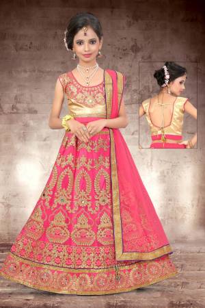 Make Your Girl Look The Prettiest Of All With This Heavy Designer Lehenga Choli In Golden Colored Blouse Paired With Pink Colored Lehenga And Dupatta. It Is Beautified With Heavy Jari Embroidery And Stone Work. Buy Now.