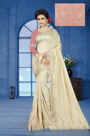 Add This Lovely Shade To Your Wardrobe With This Designer Saree In Pastel Green Color Paired With Contrasting Dusty Pink Colored Blouse. This Saree Is Sparkle Silk Based Paired With Net And Art Silk Fabricated Blouse. 