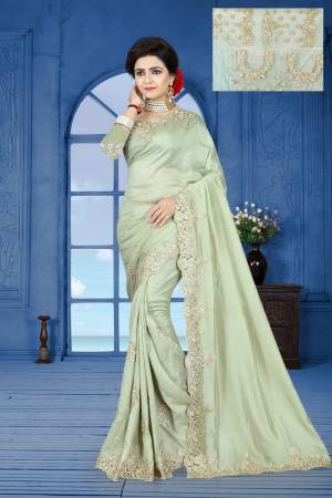 You Will Definitely Earn Lots Of Compliments Wearing This Designer Saree In Mint Green Color Paired With Mint Green Colored Blouse. This Saree IS Fabricated On Sparkle Silk Paired With Net And Art Silk Fabricated Blouse. Its Color And Embroidery Will Give A Rich And Elegant Look To Your Personality.