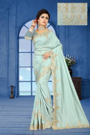 Add This Lovely Shade To Your Wardrobe With This Designer Saree In Pastel Blue Color Paired With Pastel Blue Colored Blouse. This Saree Is Sparkle Silk Based Paired With Net And Art Silk Fabricated Blouse. 