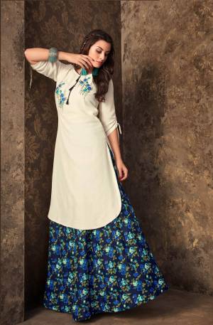 Simple And Elegant Looking Designer Readymade Pair Of Kurti And Skirt Is Here.Its Kurti Is In White Color Paired With Blue Colored Skirt. Both Are Fabricated On Muslin Beautified With Prints And Rehsam Work.
