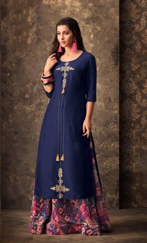 Enhance Your Personality Wearing This Designer Pair Of Kurti And Skirt In Navy Blue Color Paired With Multi Colored Skirt. This Skirt And Kurti Are Muslin Based Beautified With Prints And Resham Work.