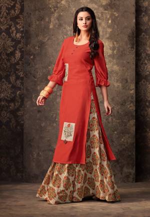 Celebrate This Festive Season Wearing This Attractive Orange Colored Readymade Kurti Paired With Cream And Orange Colored Readymade Skirt. This Skirt And Kurti Is Fabricated On Muslin Beautified With Prints And Resham Work. 