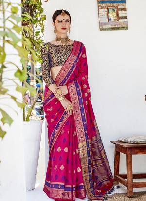 Bright And Visually Appealing Color Is Here With This Designer Saree In Dark Pink Color Paired With Contrasting Violet Colored Blouse. This Saree Is Fabricated On Nylon Silk Paired With Brocade Fabricated Blouse. Buy This Saree Now.