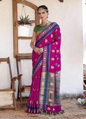 Bright And Visually Appealing Color Is Here With This Designer Saree In Dark Pink Color Paired With Contrasting Green Colored Blouse. This Saree Is Fabricated On Nylon Silk Paired With Brocade Fabricated Blouse. Buy This Saree Now.