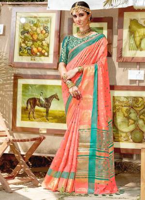 Look Attractive Wearing This Nylon silk Based Saree In Peach Color Paired With Contrasting Teal Green Colored Blouse. This Saree And Blouse Are Beautified With Weave Making It More Attractive.