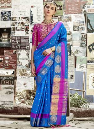 Enhance Your Personality Wearing This Silk Based Saree In Blue Color Paired With Magenta Pink Colored Blouse. This Saree IS Fabricated On Nylon Silk Paired With Brocade Fabricated Blouse. Buy Now.