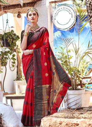 For A Bold And Beautiful Look, Grab This Designer Saree In Red Color Paired With Black Colored Blouse. This Saree Is Nylon Silk Fabricated Paired With Brocade Blouse. Buy Now.