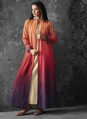 This Festive Season Look The Most Unique Of All Wearing This Designer Readymade Kurti With Jacket, Its Cream Colored Kurti Paired With Orange And Purple Colored Jacket. It Is Fabricated On Muslin Paired With Shaded Linen Fabricated Jacket. 