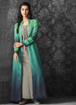 New And Unique Color Pallete Is Here With This Designer Readymade Dress In Grey Colored Inner Paired With Green And Blue Colored Jacket. Its Inner Is Fabricated On Muslin Paired With Linen Jacket. 