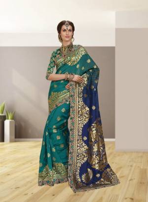 Go With The Shades Of Blue Wearing This Saree In Shades Of Blue Paired With Blue Colored Blouse. This Saree And Blouse are Fabricated On Jacquard Silk Beautified With Weave And Embroidered Lace Border. Buy This Saree Now. 