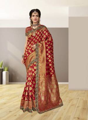 Adorn The Angelic Look Wearing This Saree In Red Color Paired With Red Colored Blouse. This Saree And Blouse Are Fabricated On Jacquard Silk Beautified With Weave And Embroidered Lace Border. Buy This Saree Now.