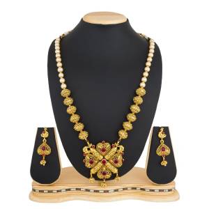 Here Is Beautiful And Royal Looking Necklace Set In Golden Color Beautified with Magenta Pink Colored Stone Work. It Is Best Suitable With Silk Saree Which Gives A Rich Look To Your Personality. Buy Now.