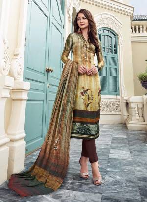 Simple And Elegant Looking Straight Suit Is Here In Beige And Multi Color Paired With Brown Colored Bottom And Beige And Multi Colored Dupatta. Its Top Is Fabricated On Satin Paired With Crepe Bottom And Chiffon Dupatta. It Is Beautified With Digital Prints And Fancy Buttons. Buy This Semi-Stitched Suit Now.