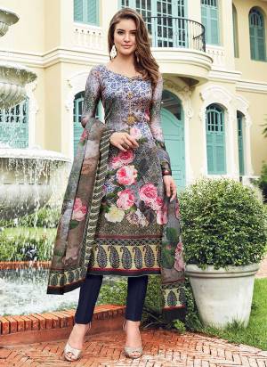 Add This Lovely Designer Digital Printed Straight Suit Yo Your Wardrobe In Dark Grey Colored Top And Dupatta paired With Navy Blue Colored Bottom .Its Top Is Satin Fabricated Paired With Crepe Bottom And Chiffon Dupatta. 