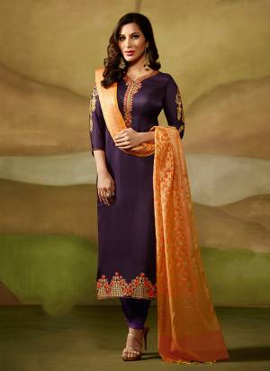 Look Attractive In This Beautiful Designer Semi Stitched Suit In Violet Color Paired With Contrasting Orange Colored Dupatta. Its Top Is Fabricated On Satin Georgette Paired With Santoon Bottom And Banarasi Silk Dupatta. Buy This Designer Suit Now.
