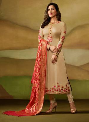 Simple And Elegant Looking Designer Semi-Stitched Suit Is Here In Beige Color Paired With Red Colored Blouse. This Saree Is Fabricated On Satin Georgette Paired With Santoon Bottom And Banarasi Silk Dupatta. All Its Fabrics Gives A Rich and Elegant Look To Your Personality.