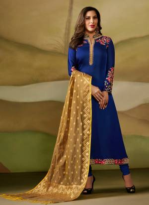 Bright And Visually Appealing Color Is Here With This Designer Semi-Stitched Suit In Royal Blue Color Paired With Beige Colored Dupatta. Its Top Is Fabricated On Satin Georgette Paired With Santoon Bottom And Banarasi Silk Dupatta. Buy Now.