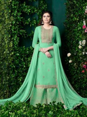 Grab This Beautiful Designer Plazzo Suit In Light Green Color Paired With Light Green Colored Dupatta. Its Heavy Embroidered Top And Bottom Are Georgette Based Paired With Chiffon Dupatta. 
