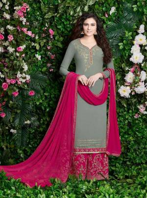 Elegant And Rich Looking Designer Plazzo Suit Is Here In Grey Colored Top Paired With Contrasting Rani Pink Colored Bottom And Dupatta. Its Top And Bottom Are Georgette Based Paired With Chiffon Dupatta. Buy This Suit Now.
