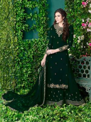 Dark Colors Always Gives A Fresh And Sleek Look To Your Personality, So Grab This Designer Plazzo Suit In Forest Green Color Paired With Forest Green Colored Bottom And Dupatta. Its Top and Bottom Are Georgette Based Paired With Chiffon Dupatta. Buy Now.