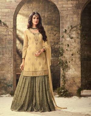 Subtle Shades Never Goes Out Of Style, So Grab This Beautiful Designer Sharara Suit In Light Yellow Colored Top And Dupatta Paired With Contrasting Mint Green Colored Bottom. Its Top And Bottom Are Georgette Based Paired With Chiffon Dupatta. 