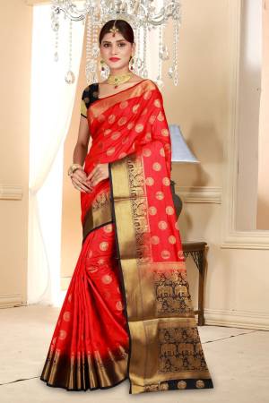 Adorn the Pretty Angelic And Royal Look Wearing This Saree In Red color Paired With Black Colored Blouse. This Saree And Blouse Are Art Silk Based Beautified With Weave All Over. Buy Now.